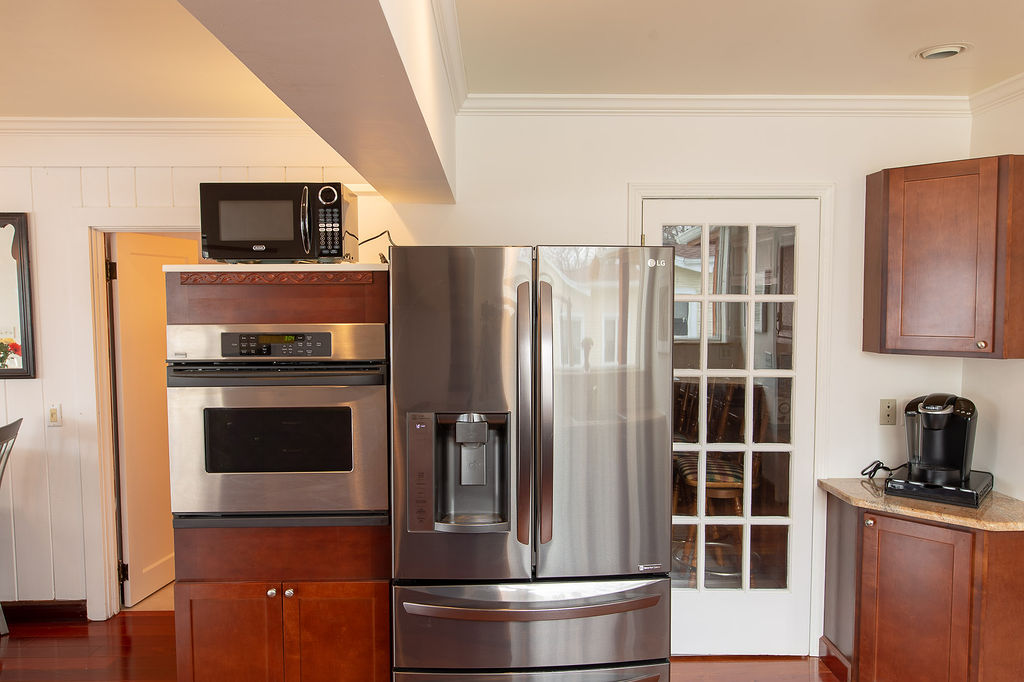 Oven, Microwave, and Family-sized Refridgerator and Freezer