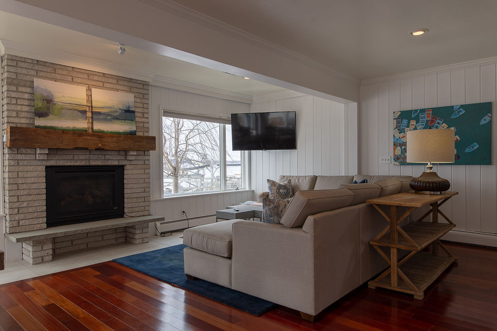 Family Room with a Gas Fireplace and 55 inch 4K TV