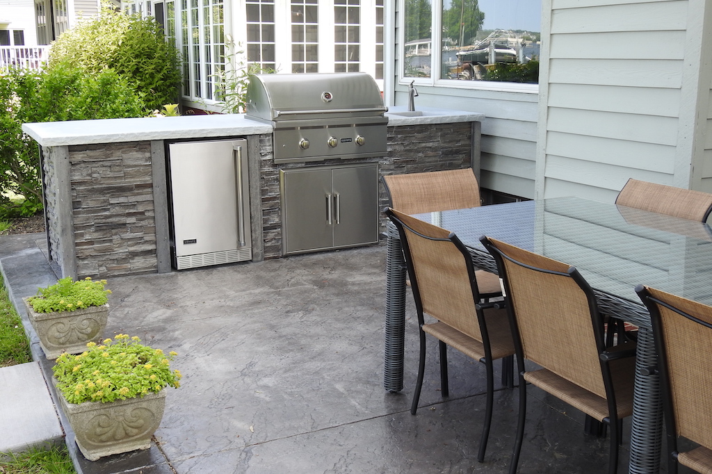 New Outdoor Kitchen With Grill, Refridgerator, and Sink